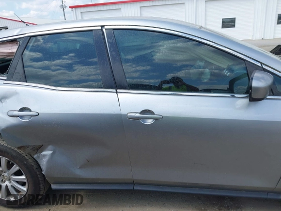 2010 Mazda CX-7 Sport z VIN JM3ER2W59A0301241, wystawiony jako IAAI lot #42215731 z przebiegiem 172 716 mil mil oraz . Historia ofert i sprzedaży dostępna na DreamBid. Obrazek 13.
