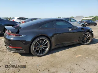 2021 Porsche 911 Carrera with VIN WP0AA2A93MS206806, listed as a Copart auction lot 58923294 with 25,088 mi miles and Salvage Title. Bid and sale history available at carsss.com. Image 3.