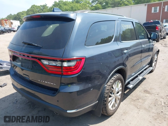 2014 Dodge Durango Citadel with VIN 1C4RDJEG8EC480656, listed as a IAAI auction lot 42438581 with 182,615 mi miles and . Bid and sale history available at DreamBid. Image 4.