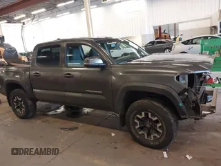 2016 Toyota Tacoma SR with VIN 3TMCZ5AN2GM041649, listed as a IAAI auction lot 41758859 with 139,558 mi miles and . Bid and sale history available at DreamBid. Image 14.