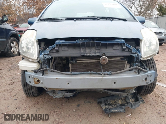 2009 Toyota Yaris with VIN JTDKT903195255240, listed as a IAAI auction lot 41650800 with 168,991 mi miles. Bid and sale history available at carsss.com. Image 6.