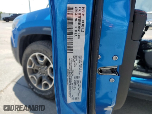 2021 Jeep Cherokee Trailhawk with VIN 1C4PJMBXXMD110436, listed as a Copart auction lot 57829375 with 46,647 mi miles and Salvage title. Bid and sale history available at DreamBid. Image 13.
