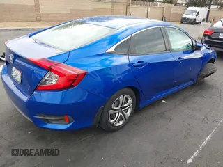 2018 Honda Civic LX with VIN 2HGFC2F51JH527351, listed as a IAAI auction lot 42071411 with 88,606 mi miles and . Bid and sale history available at DreamBid. Image 4.