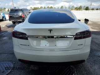 2017 Tesla Model S 100D z VIN 5YJSA1E21HF229936, wystawiony jako Copart lot #54734955 z przebiegiem 125 511 mil mil oraz Szkoda całkowita • Salvage title. Historia ofert i sprzedaży dostępna na DreamBid. Obrazek 6.