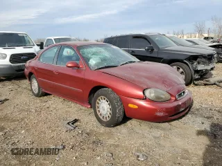 1999 Mercury Sable GS with VIN 1MEFM50U0XA660783, listed as a Copart auction lot 45947104 with 183,026 mi miles and Non Repairable. Bid and sale history available at DreamBid. Image 4.