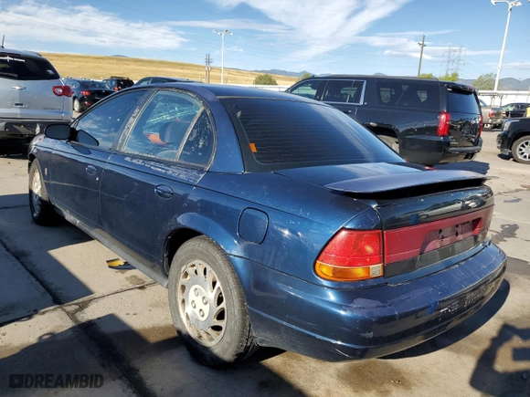 1999 Saturn SL with VIN 1G8ZJ5272XZ141986, listed as a Copart auction lot 71496674 with 0 mi miles and Salvage Title. Bid and sale history available at carsss.com. Image 2.