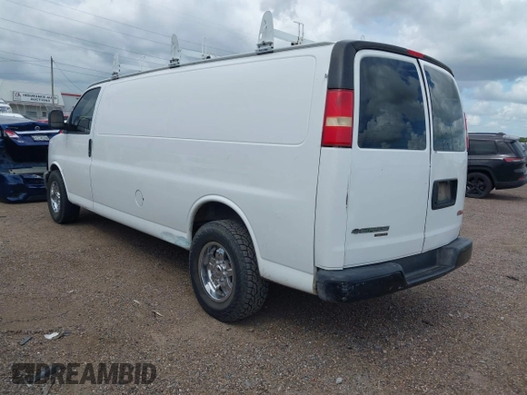 2014 Chevrolet Express Cargo z VIN 1GCWGGBA8E1122630, wystawiony jako IAAI lot #42695749 z przebiegiem 208 291 mil mil oraz . Historia ofert i sprzedaży dostępna na DreamBid. Obrazek 3.