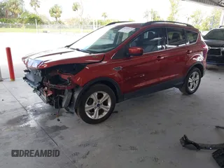 2016 Ford Escape SE with VIN 1FMCU0GX1GUB12017, listed as a IAAI auction lot 40760172 with 174,572 mi miles. Bid and sale history available at carsss.com. Image 2.