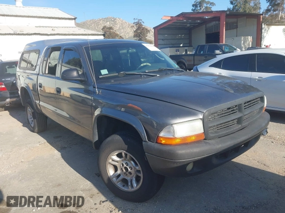 2003 Dodge Dakota SLT with VIN 1D7HG48N33S248568, listed as a IAAI auction lot 41834084 with 153,001 mi miles and . Bid and sale history available at DreamBid. Image 1.