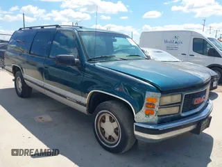 1995 GMC Suburban with VIN 1GKEC16KXSJ712111, listed as a IAAI auction lot 42185423 with 269,010 mi miles and . Bid and sale history available at DreamBid. Image 1.