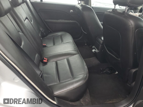 2010 Ford Fusion Hybrid z VIN 3FADP0L30AR122805, wystawiony jako Copart lot #52276255 z przebiegiem 146 073 mil mil oraz Szkoda całkowita • Salvage title. Historia ofert i sprzedaży dostępna na DreamBid. Obrazek 11.