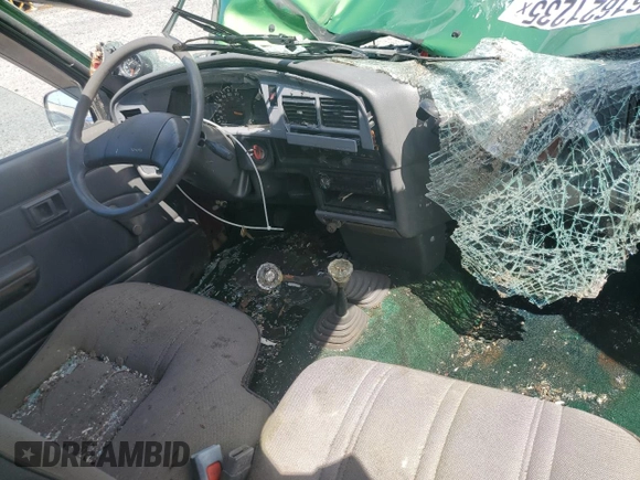 1991 Toyota Pickup z VIN JT4RN13P9M6023450, wystawiony jako Copart lot #61621235 z przebiegiem 599 120 mil mil oraz Szkoda całkowita • Salvage title. Historia ofert i sprzedaży dostępna na DreamBid. Obrazek 8.