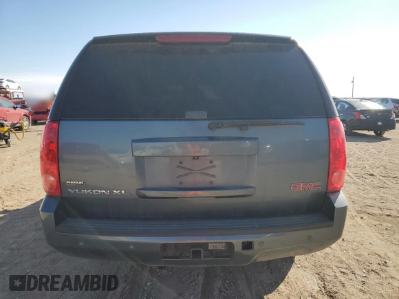 2010 GMC Yukon XL z VIN 1GKUKKE36AR211005, wystawiony jako Copart lot #45373575 z przebiegiem 164 622 mil mil oraz Szkody całkowita. Historia ofert i sprzedaży dostępna na DreamBid. Obrazek 6.