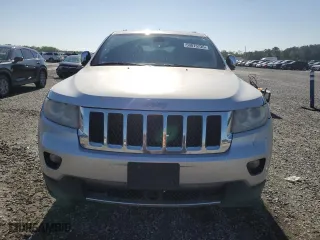2012 Jeep Grand Cherokee Overland with VIN 1C4RJFCG5CC272580, listed as a Copart auction lot 50075735 with 209,368 mi miles and Salvage Title. Bid and sale history available at carsss.com. Image 5.