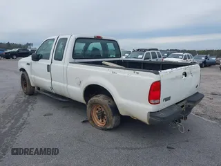 2004 Ford Super Duty F-250 XL with VIN 1FTNX20LX4EB97517, listed as a IAAI auction lot 41277987 with 202,880 mi miles. Bid and sale history available at carsss.com. Image 3.