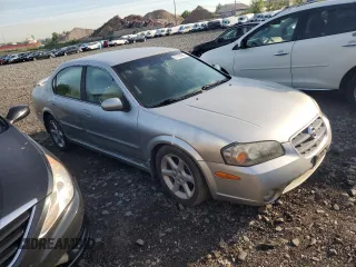 2003 Nissan Maxima SE z VIN JN1DA31D83T505047, wystawiony jako Copart lot #57708995 z przebiegiem 110 054 mil mil oraz Czysty tytuł • Clean title. Historia ofert i sprzedaży dostępna na DreamBid. Obrazek 4.