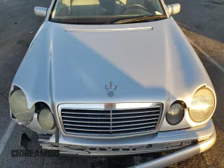 1999 Mercedes-Benz E-Class with VIN WDBJF65H8XA734585, listed as a Copart auction lot 79141194 with 196,908 mi miles and Salvage Title. Bid and sale history available at carsss.com. Image 11.