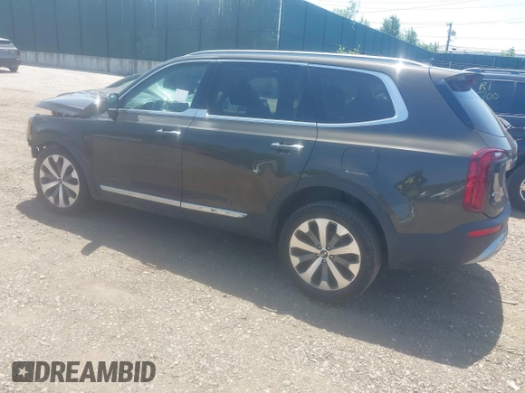 2020 Kia Telluride S with VIN 5XYP6DHC4LG085717, listed as a IAAI auction lot 42436243 with 56,930 mi miles and . Bid and sale history available at DreamBid. Image 3.