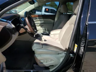 2016 Cadillac SRX Premium Collection with VIN 3GYFNDE31GS582600, listed as a Copart auction lot 49355745 with 136,365 mi miles and Salvage Title. Bid and sale history available at carsss.com. Image 7.