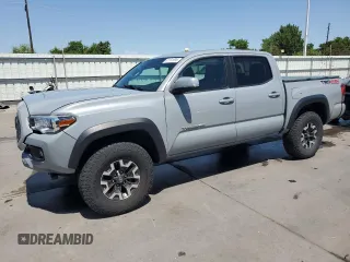 2019 Toyota Tacoma SR with VIN 3TMCZ5AN6KM282218, listed as a Copart auction lot 61191095 with 66,603 mi miles and Salvage title. Bid and sale history available at DreamBid. Image 1.