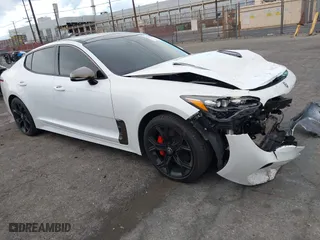 2018 Kia Stinger GT1 with VIN KNAE45LC5J6040809, listed as a IAAI auction lot 41265816 with 54,675 mi miles. Bid and sale history available at carsss.com. Image 1.