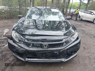 2019 Honda Civic LX with VIN 19XFC2F64KE041024, listed as a IAAI auction lot 42020159 with 36,870 mi miles and . Bid and sale history available at DreamBid. Image 12.