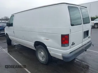 2004 Ford Econoline Cargo with VIN 1FTRE14W94HA87305, listed as a IAAI auction lot 41719727 with Not Provided miles. Bid and sale history available at carsss.com. Image 3.