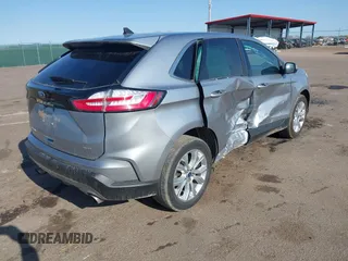 2022 Ford Edge Titanium z VIN 2FMPK4K95NBA33637, wystawiony jako IAAI lot #42074777 z przebiegiem 58 733 mil mil oraz . Historia ofert i sprzedaży dostępna na DreamBid. Obrazek 4.