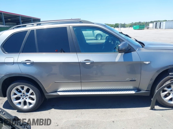 2011 BMW X5 35i z VIN 5UXZV4C57BL410981, wystawiony jako IAAI lot #42126240 z przebiegiem 160 473 mil mil oraz . Historia ofert i sprzedaży dostępna na DreamBid. Obrazek 13.