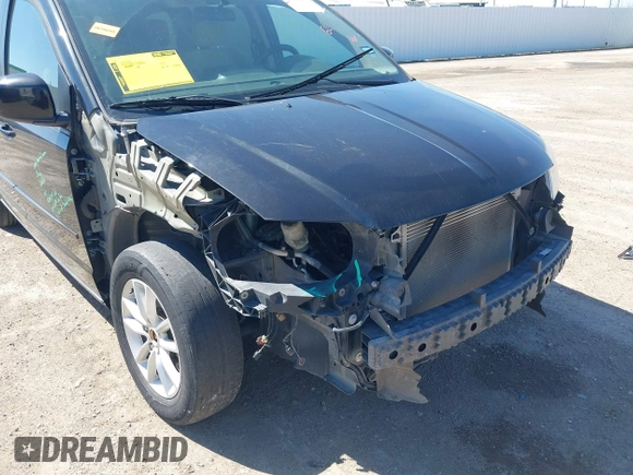 2016 Dodge Grand Caravan SXT with VIN 2C4RDGCG0GR387856, listed as a IAAI auction lot 41769163 with 103,856 mi miles and . Bid and sale history available at DreamBid. Image 6.