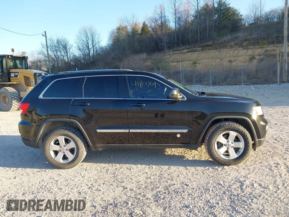2012 Jeep Grand Cherokee Laredo with VIN 1C4RJFAG3CC246577, listed as a IAAI auction lot 41807693 with 164,574 mi miles. Bid and sale history available at carsss.com. Image 13.