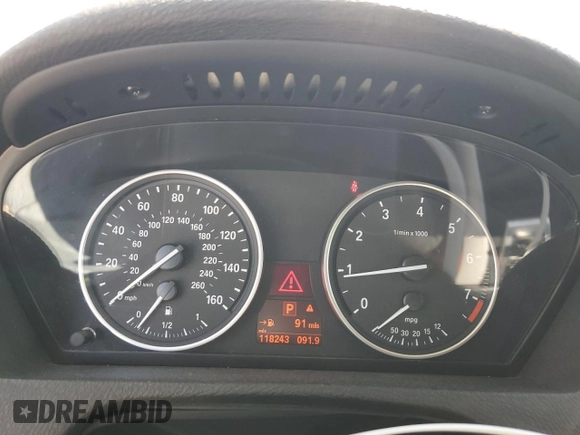 2013 BMW X5 xDrive35i z VIN 5UXZV4C50D0E05712, wystawiony jako Copart lot #57557575 z przebiegiem 118 243 mil mil oraz Szkoda całkowita • Salvage title. Historia ofert i sprzedaży dostępna na DreamBid. Obrazek 9.