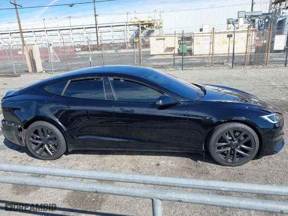 2022 Tesla Model S with VIN 5YJSA1E52NF488134, listed as a IAAI auction lot 41681556 with 1 mi miles. Bid and sale history available at carsss.com. Image 13.