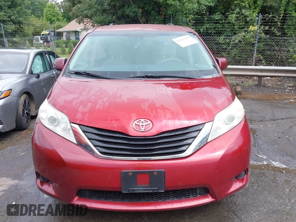 2012 Toyota Sienna z VIN 5TDKA3DC5CS012254, wystawiony jako IAAI lot #42367254 z przebiegiem 183 083 mil mil oraz . Historia ofert i sprzedaży dostępna na DreamBid. Obrazek 12.