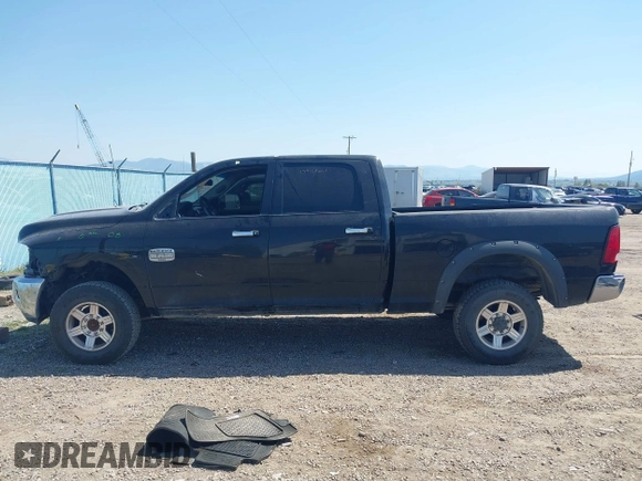 2012 Ram 2500 Laramie Longhorn with VIN 3C6UD5GL8CG182590, listed as a IAAI auction lot 42135638 with 232,377 mi miles and . Bid and sale history available at DreamBid. Image 15.