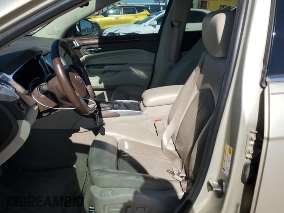 2015 Cadillac SRX Premium Collection with VIN 3GYFNDE32FS536692, listed as a Copart auction lot 54669175 with 80,484 mi miles and Salvage title. Bid and sale history available at DreamBid. Image 7.
