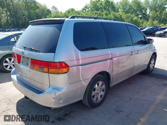 2004 Honda Odyssey EX-L with VIN 5FNRL18934B018040, listed as a IAAI auction lot 42241081 with 250,607 mi miles and . Bid and sale history available at DreamBid. Image 4.