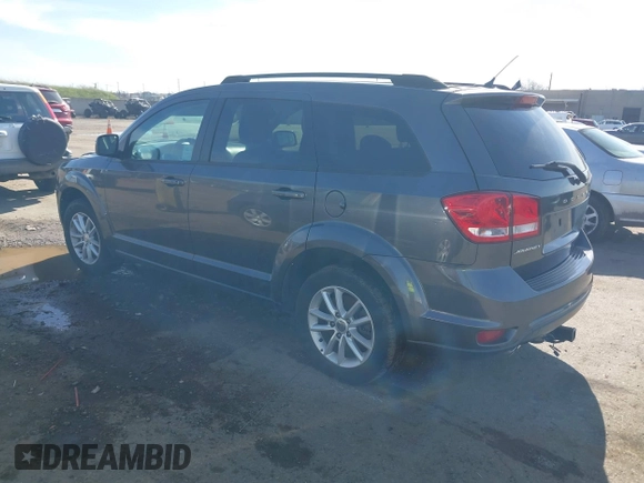 2015 Dodge Journey SXT with VIN 3C4PDCBG9FT696593, listed as a IAAI auction lot 41600713 with 139,763 mi miles. Bid and sale history available at carsss.com. Image 3.