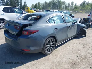 2023 Mazda 3 S Carbon Edition with VIN 3MZBPACM5PM376545, listed as a IAAI auction lot 42404054 with Not provided miles and . Bid and sale history available at DreamBid. Image 4.