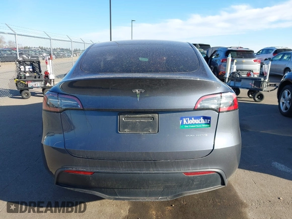 2023 Tesla Model Y Long Range with VIN 7SAYGAEEXPF714760, listed as a IAAI auction lot 41748398 with 49,802 mi miles and . Bid and sale history available at DreamBid. Image 17.