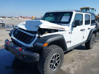2024 Jeep Wrangler Rubicon with VIN 1C4PJXFG6RW291185, listed as a IAAI auction lot 41773050 with 12,400 mi miles and . Bid and sale history available at DreamBid. Image 17.