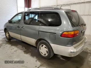 1999 Toyota Sienna LE with VIN 4T3ZF13C2XU123953, listed as a Copart auction lot 52193705 with 174,886 mi miles and Clean Title. Bid and sale history available at carsss.com. Image 2.