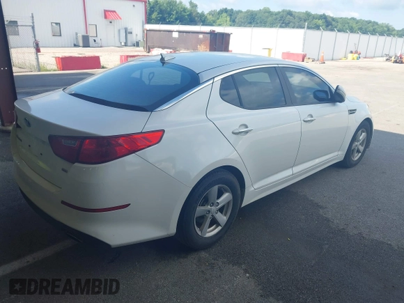 2015 Kia Optima LX with VIN KNAGM4A77F5568339, listed as a IAAI auction lot 42695740 with 135,632 mi miles and . Bid and sale history available at DreamBid. Image 4.