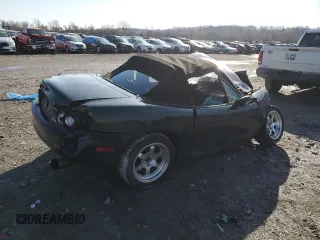 1999 Mazda MX-5 Miata z VIN JM1NB3536X0133733, wystawiony jako Copart lot #50906215 z przebiegiem Nie podano mil oraz Szkoda całkowita • Salvage title. Historia ofert i sprzedaży dostępna na DreamBid. Obrazek 3.
