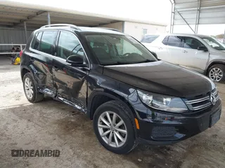 2017 Volkswagen Tiguan Wolfsburg Edition with VIN WVGRV7AX5HW501063, listed as a IAAI auction lot 42099362 with 76,597 mi miles and . Bid and sale history available at DreamBid. Image 1.