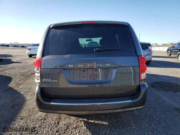 2014 Dodge Grand Caravan SE with VIN 2C4RDGBG7ER189645, listed as a Copart auction lot 46397245 with 71,185 mi miles and Salvage Title. Bid and sale history available at carsss.com. Image 6.