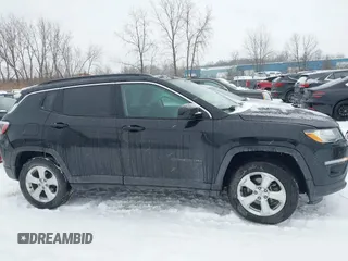 2018 Jeep Compass Altitude with VIN 3C4NJDBB6JT307069, listed as a IAAI auction lot 41351646 with 50,387 mi miles and . Bid and sale history available at carsss.com. Image 13.