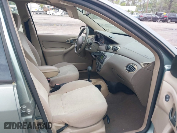 2004 Ford Focus ZTS with VIN 1FAFP38Z74W117402, listed as a IAAI auction lot 42035928 with 113,393 mi miles and . Bid and sale history available at carsss.com. Image 5.