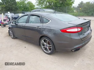 2016 Ford Fusion Titanium with VIN 3FA6P0D97GR133823, listed as a IAAI auction lot 42429708 with 166,105 mi miles and . Bid and sale history available at DreamBid. Image 3.
