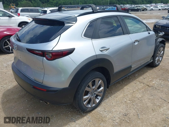 2021 Mazda CX-30 Select with VIN 3MVDMBBL1MM245514, listed as a IAAI auction lot 42517295 with 71,270 mi miles and . Bid and sale history available at DreamBid. Image 4.